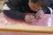 Artist works on a traditional mandala