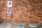Artist workspace painting workshop loft brick wall