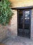 Artistic door with grille and glass