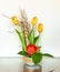 Artistic Flower Arrangements with Three Orange Tulips and a Single Red Tulip.
