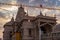 artistic hindu temple with dramatic sunset sky at evening from unique perspective