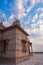 artistic hindu temple with dramatic sunset sky at evening from unique perspective