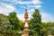 artistic jain red stone holy pillar at morning from unique angle