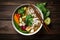 Artistic overhead shot of a colorful Pho bowl with vibrant vegetables, tofu, and noodles in a clear broth