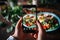 Artistic Person taking photo tasty food. Generate Ai