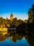 Artistic photo of Timisoara cathedral reflecting in Bega river