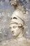 Artistic portrait with textured background, classical Greek sculpture