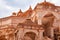 artistic red stone jain temple at morning from unique angle