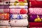 Artistic variety shade tone colors Bed sheets stacked on retail Shop Shelf to sale