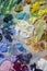 Artists acrylic paint palette close up semi abstract full frame