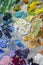 Artists acrylic paint palette close up semi abstract full frame background