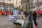 Artists awaiting customers amongst easels and artwork set up in Place du Tertre in Montmartre Paris, France