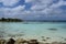 Aruba, Renaissance Island, Caribbean Sea. Sunny beach with white sand, coconut palm trees and turquoise sea. Summer vacation,