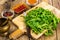 Arugula-ingredient salad on wooden Boards