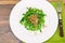 Arugula Salad with Germinated Grain in White Plate