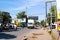 Arusha, Tanzania; 08/06/2019: Lifestyle picture. Cars and motorbikes driving on a road in Arusha with poor buildings on both sides