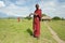 Arusha, Tanzania, February 07, 2016: Massai man standing in front of the house