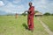 Arusha, Tanzania, February 07, 2016: Massai man standing in front of the house