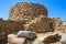 Arzachena, Sardinia, Italy -Archeological ruins of Nuragic complex La Prisgiona - Nuraghe La Prisgiona - with stone main tower and
