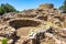 Arzachena, Sardinia, Italy - Archeological ruins of Nuragic complex La Prisgiona - Nuraghe La Prisgiona - with stone main tower