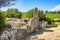 Arzachena, Sardinia, Italy - Archeological ruins of Nuragic necropolis Giants Tomb of Coddu Vecchiu  - Tomba di Giganti Coddu