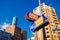 Asakusa dori and Edo dori Avenue street sign with buildings against bright blue sky day