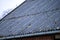 Asbestic tile on the barn roof, Bieszczady Mountains, Poland. Dangerous asbestos roofs are still common in the poverty parties of