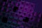 Asbtar futuristic background made of neon cubes on a purple background