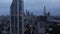 Ascending footage of Two Fifty One high rise apartment building. Evening panoramic view of cityscape and City