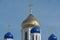 Ascension Cathedral - the main Orthodox church of the city of Yelets, Russian. Golden domes on the background of a beautiful sky