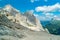 Ascent to Marmolada, Dolomites, Italy. The Marmolada Glacier. Tourist climbing on Marmolada mountain in dolomites. Ice axe in the