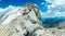 Ascent to Marmolada, Dolomites, Italy. The Marmolada Glacier. Tourist climbing on Marmolada mountain in dolomites. Ice axe in the