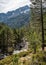 Asco river and snow capped mountain in Corsica