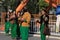 Ashgabad, Turkmenistan - October 10, 2014. Unidentified schoolgirls in national dress are having fun at amusement park on