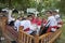 Ashgabat, Turkmenistan - August, 14, 2019: Group of young musicians in traditional national  clothes before the performance at the