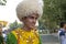Ashgabat, Turkmenistan - September, 3, 2017 : Smiling young man in in national costume before the performance at the Kurban-Baira