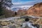 Ashness Bridge and snow capped Skiddaw