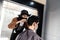 Asia Barber Shop Hair cut queueing customer`s wearing face mask prevention business reopening