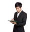 Asia businessman writing on file pad