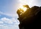 Asia couple hiking help each other silhouette in mountains with sunlight. couple hiking help each other silhouette in mountains