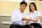 Asia couple of teenage holding house model as future plan