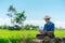 Asia farmers in field using digital tablet,Read a book