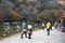 Asia, Japan. Kyoto, Sagano, Arashiyama, people walking next to river,