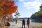 Asia, Japan. Kyoto, Sagano, Arashiyama, people walking next to river,