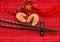 Asia style background with lucky charm, fortune cookies and black chopsticks