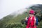 Asia trekker woman in red