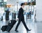 Asian air flight male attendant in International airport of Inch