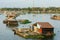 Asian aquaculture, La Nga river, floating house
