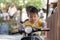 Asian Baby Boy toddler riding driving Motorcycle or motorbike