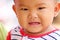 Asian baby of toddler and have teething in smile with happily.